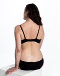 Wireless one-cup mastectomy bra in soft silky black fabric, post-surgery lingerie by ENO
