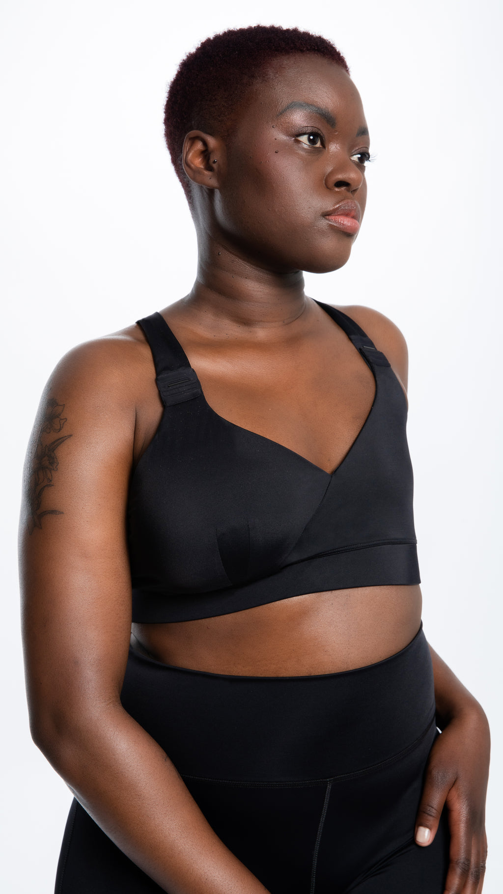 Full-length portrait of model wearing post-mastectomy sports bra - Sports Bra for ONE by ENO